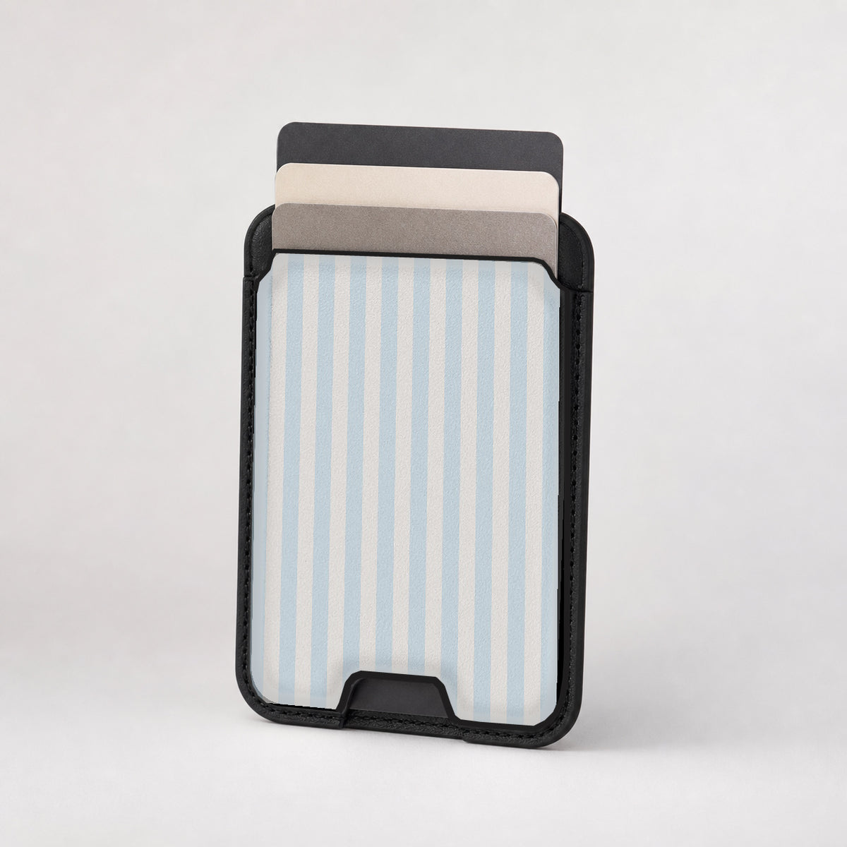 Powder Blue Pinstripe MagSafe card holder showing the patterned front