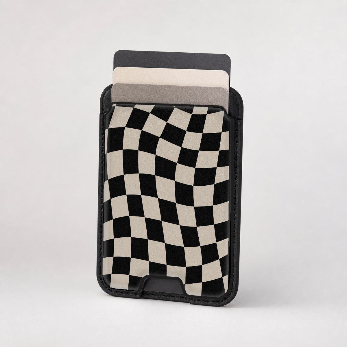 Black Cream Wavy Checkerboard MagSafe card holder showing the patterned front