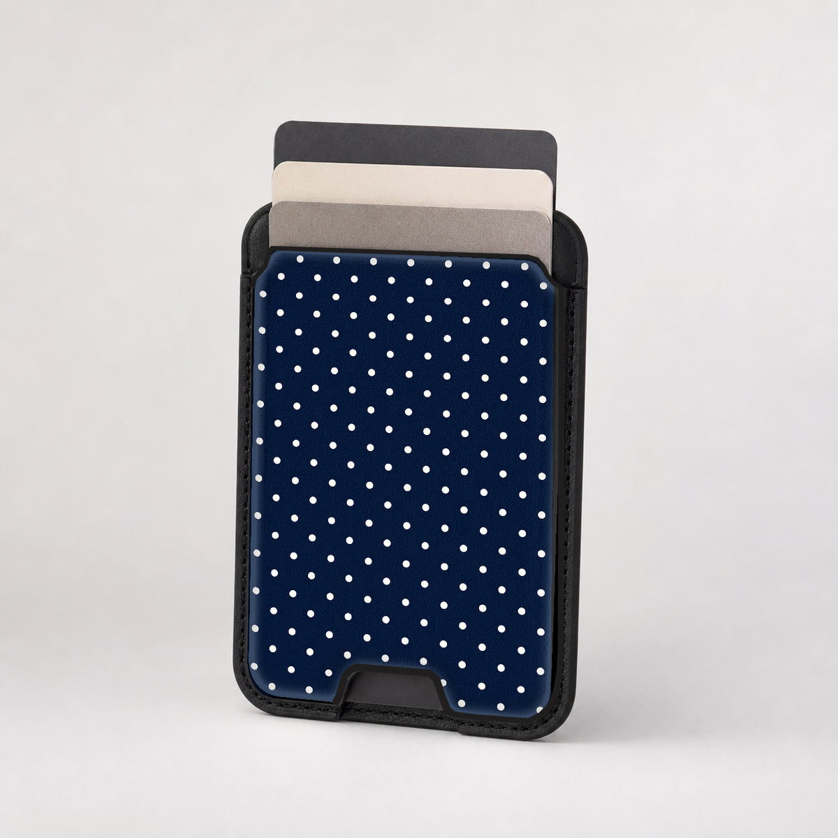 Navy Mini Polka Dot MagSafe card holder showing the patterned front