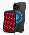 Burgundy Mini Polka Dot MagSafe card holder attached to a compatible iPhone