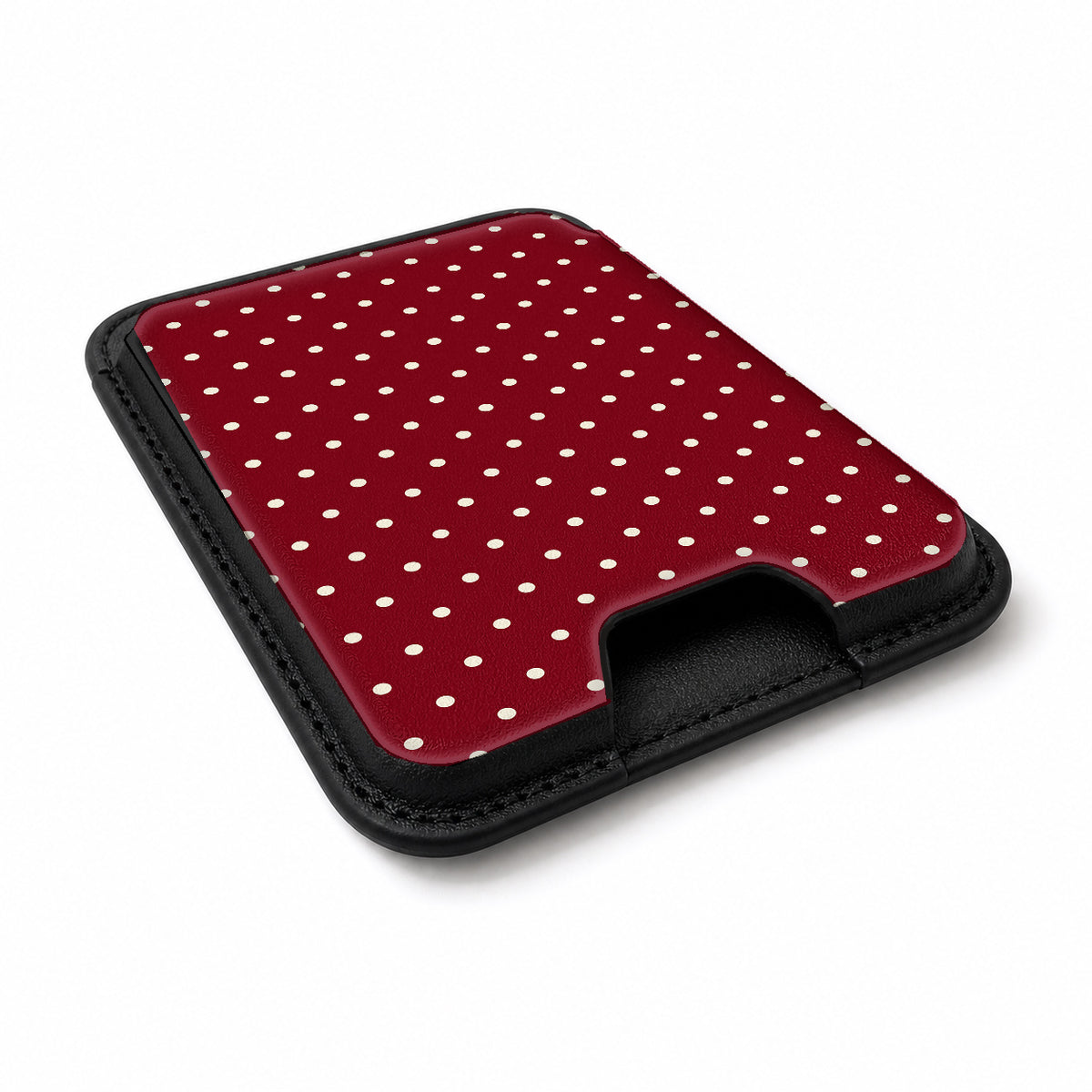 Burgundy Mini Polka Dot MagSafe card holder showing the angled leather surface