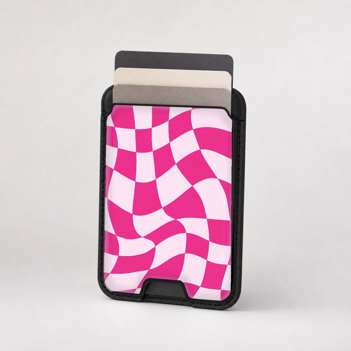 Hot Pink Wavy Checkerboard MagSafe card holder showing the patterned front
