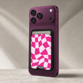 Hot Pink Wavy Checkerboard MagSafe card holder showing the detailed leather finish