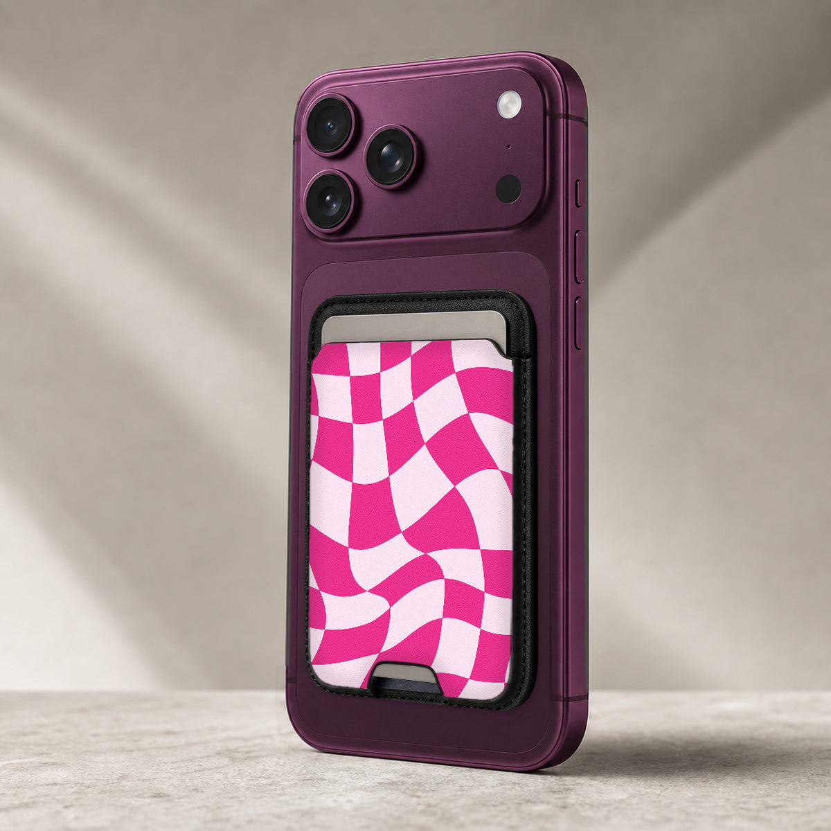 Hot Pink Wavy Checkerboard MagSafe card holder showing the detailed leather finish