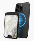 White Gold Marble MagSafe card holder attached to a compatible iPhone