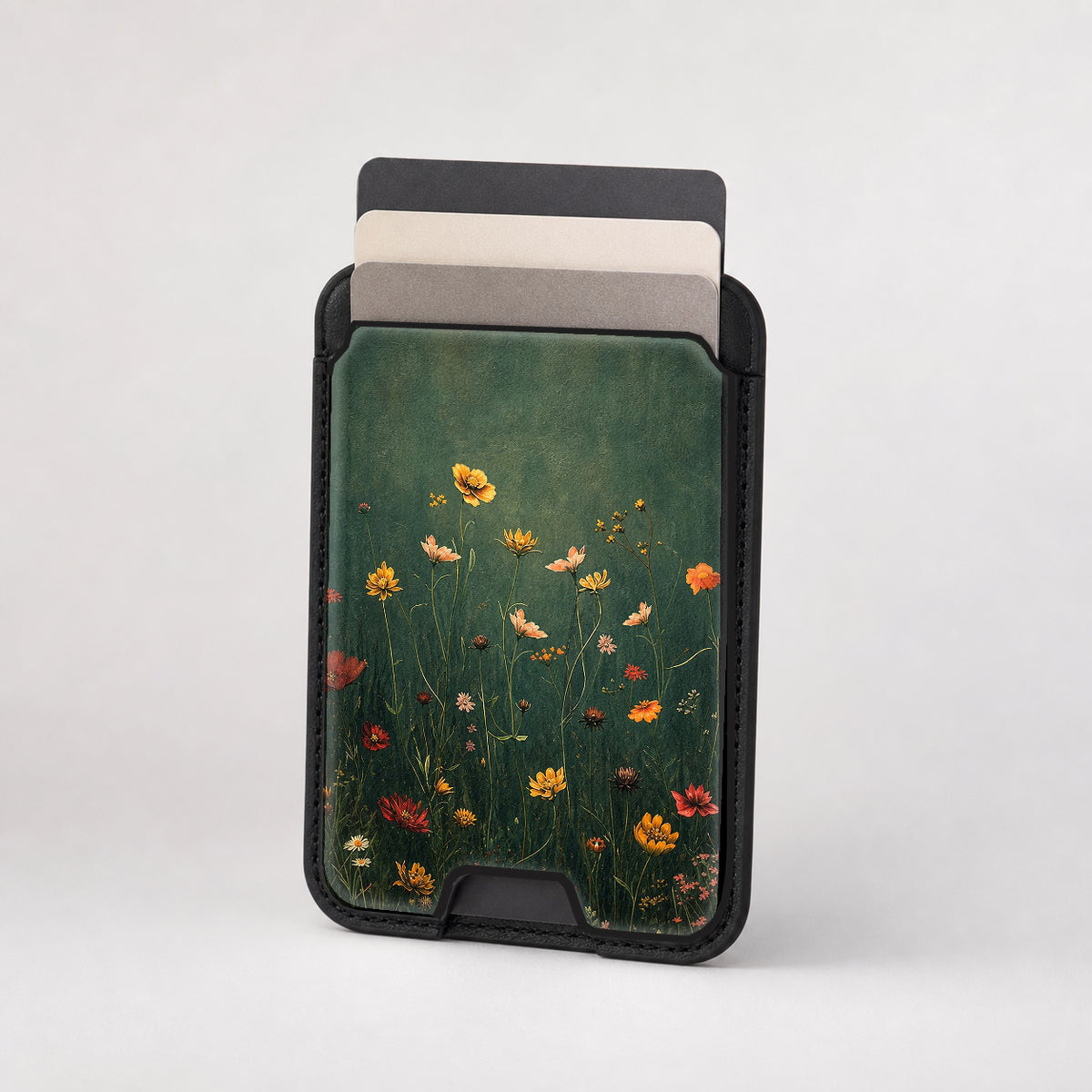 Dark Green Golden Wildflower Meadow MagSafe card holder showing the patterned front