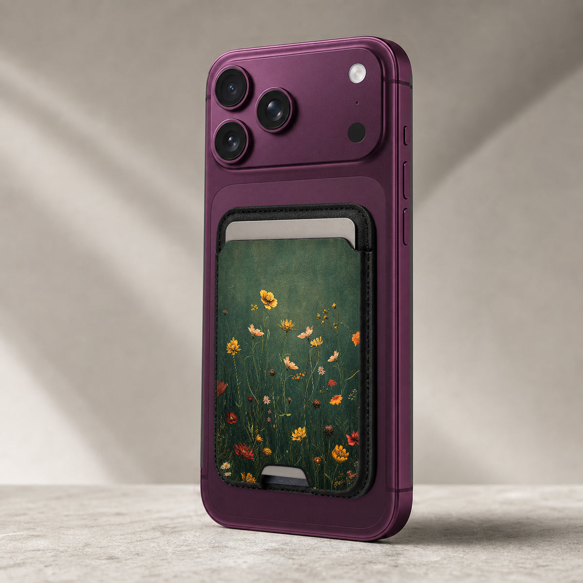 Dark Green Golden Wildflower Meadow MagSafe card holder showing the detailed leather finish
