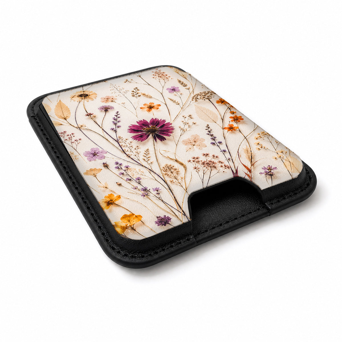 Pressed Wildflower Bouquet MagSafe card holder showing the angled leather surface