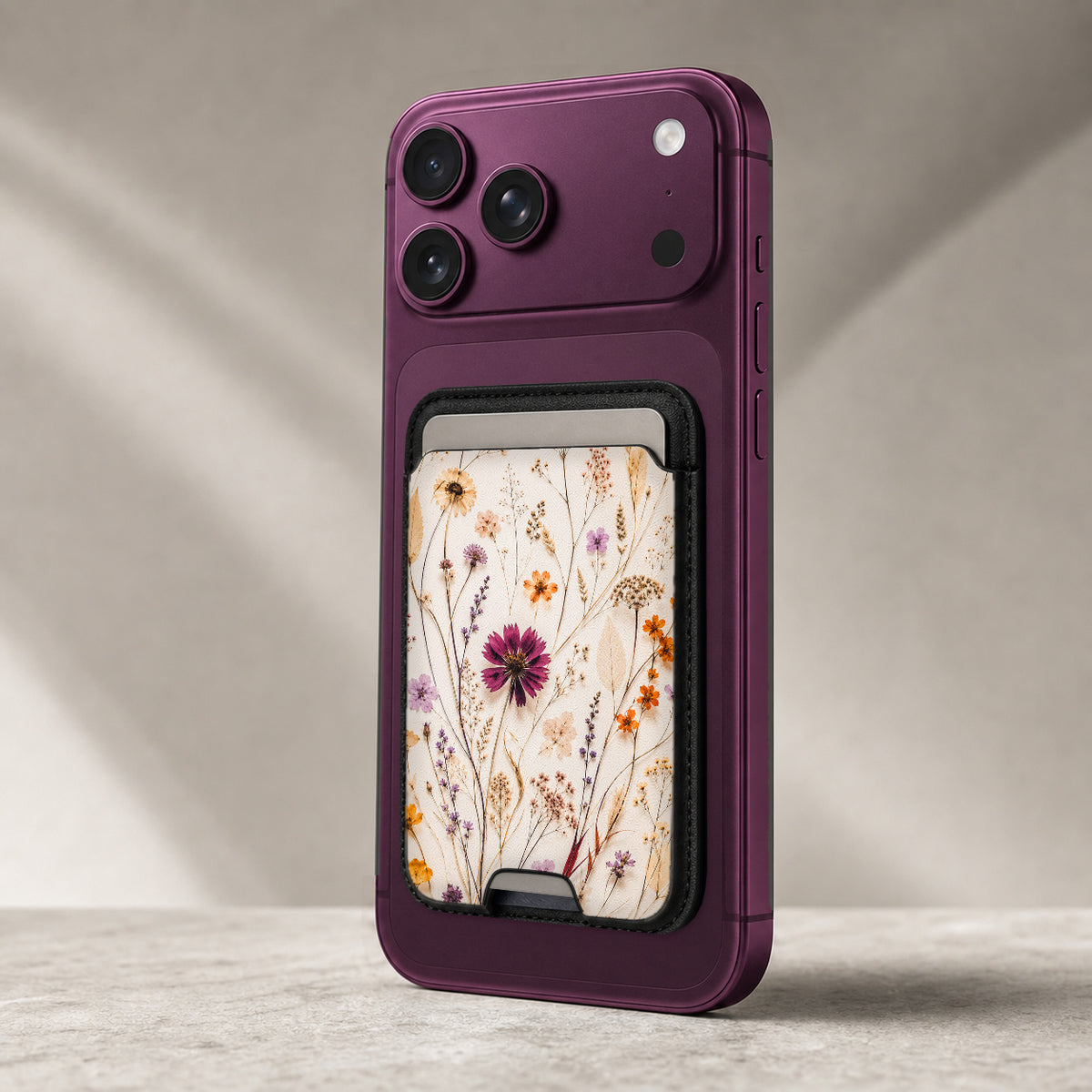 Pressed Wildflower Bouquet MagSafe card holder showing the detailed leather finish
