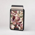 Dusty Rose Magnolia Floral MagSafe card holder showing the patterned front