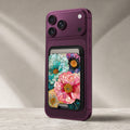 Teal Pink Stained Glass Floral MagSafe card holder showing the detailed leather finish