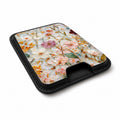 Warm Wildflower Stained Glass MagSafe card holder showing the angled leather surface