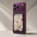 Warm Wildflower Stained Glass MagSafe card holder showing the detailed leather finish