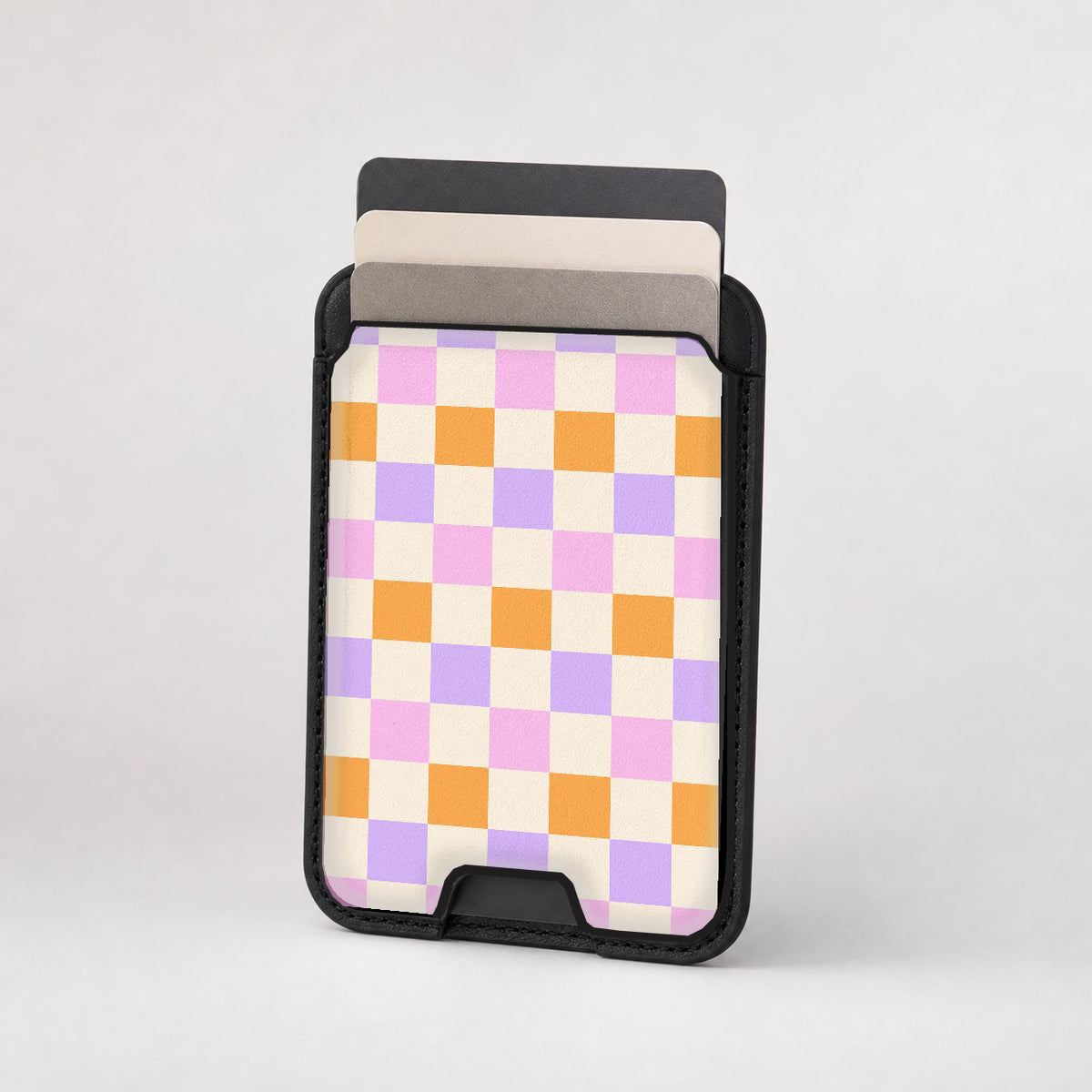 Lavender Peach Checkerboard MagSafe card holder showing the patterned front