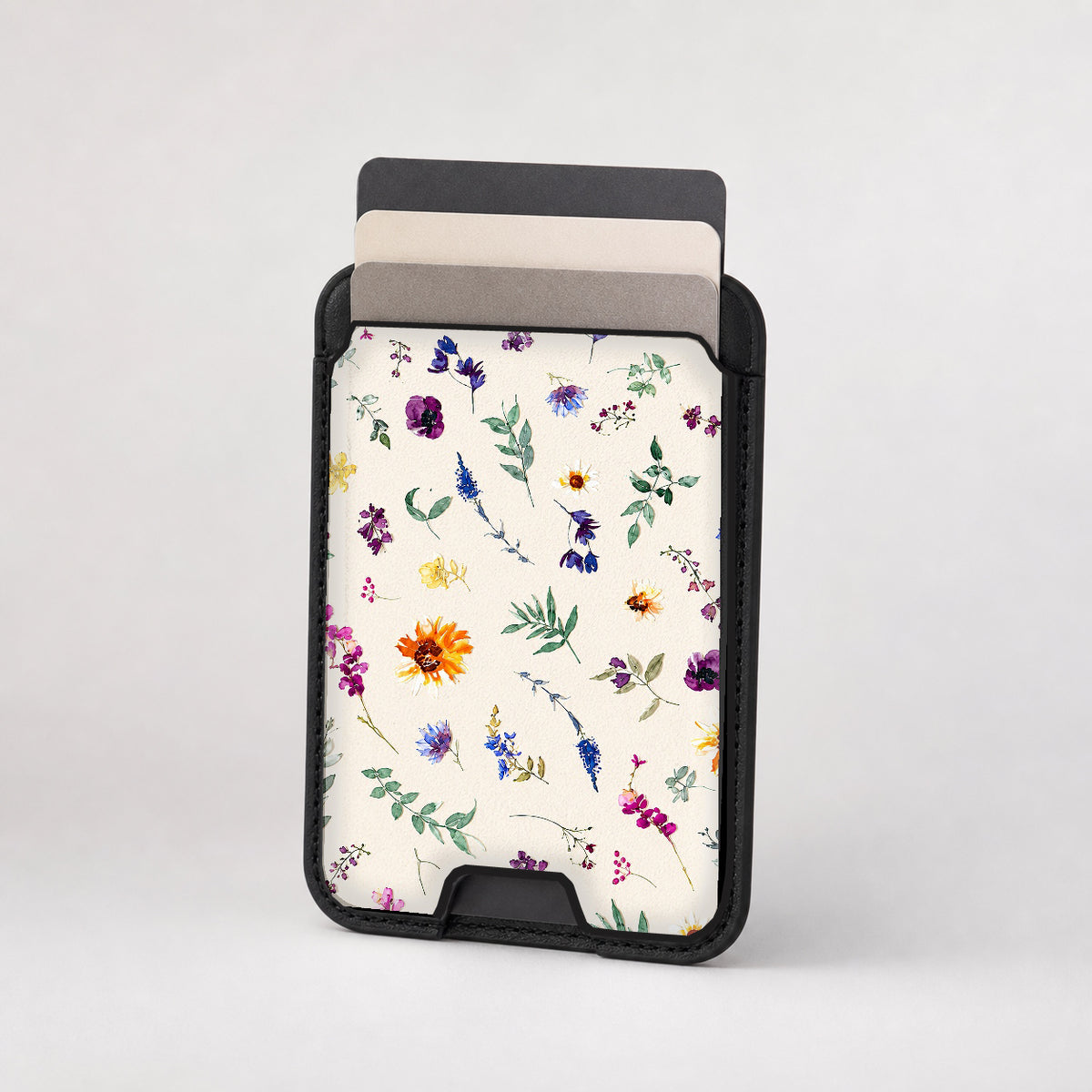 Delicate Mixed Wildflower MagSafe card holder showing the patterned front