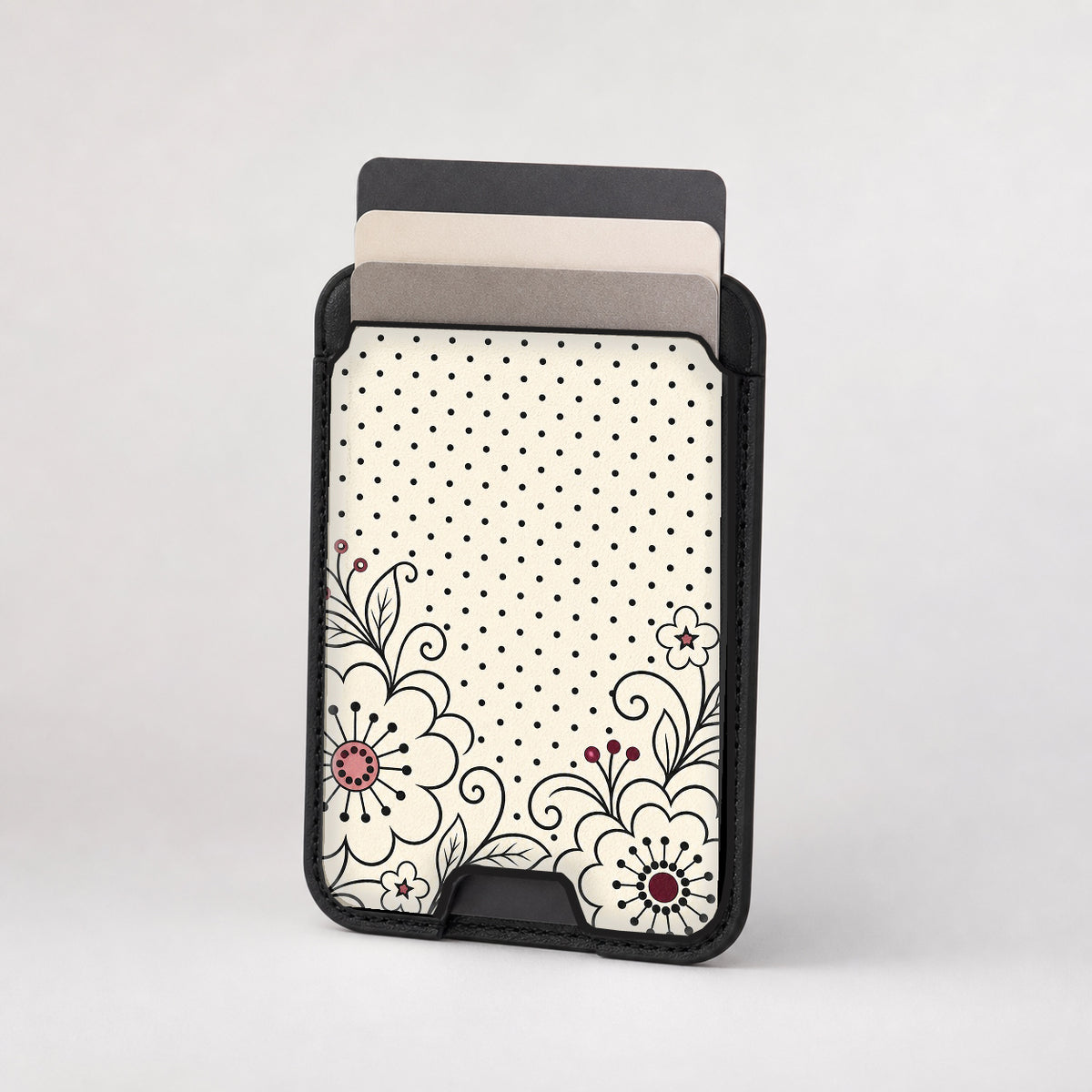 Black White Doodle Floral MagSafe card holder showing the patterned front