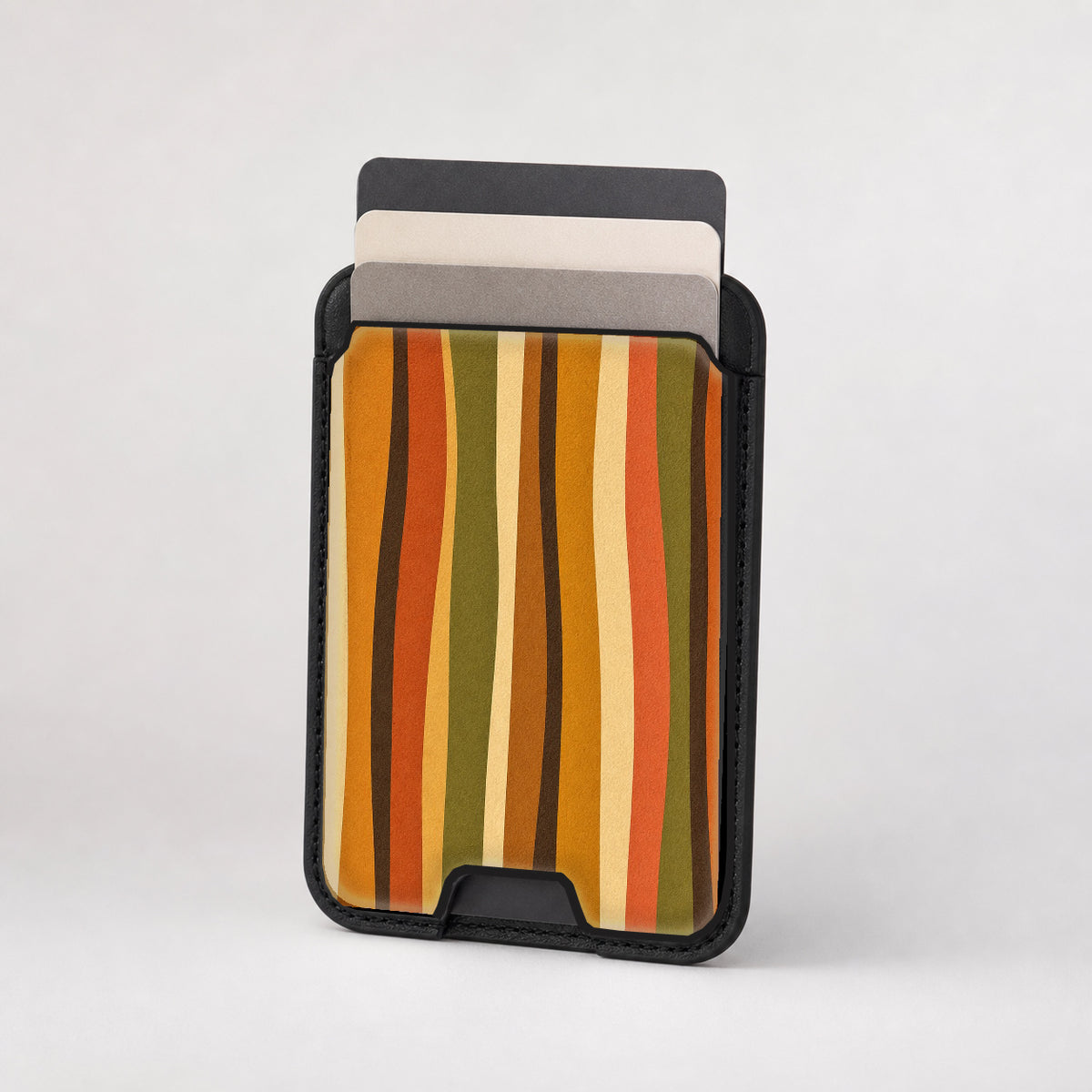 Retro Sunset Stripe MagSafe card holder showing the patterned front