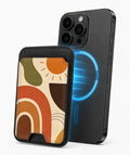 Terracotta Boho Arch MagSafe card holder attached to a compatible iPhone