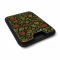 Dark Arts and Crafts Floral MagSafe card holder showing the angled leather surface