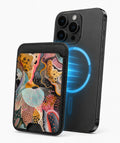 Colorful Abstract Organic Collage MagSafe card holder attached to a compatible iPhone
