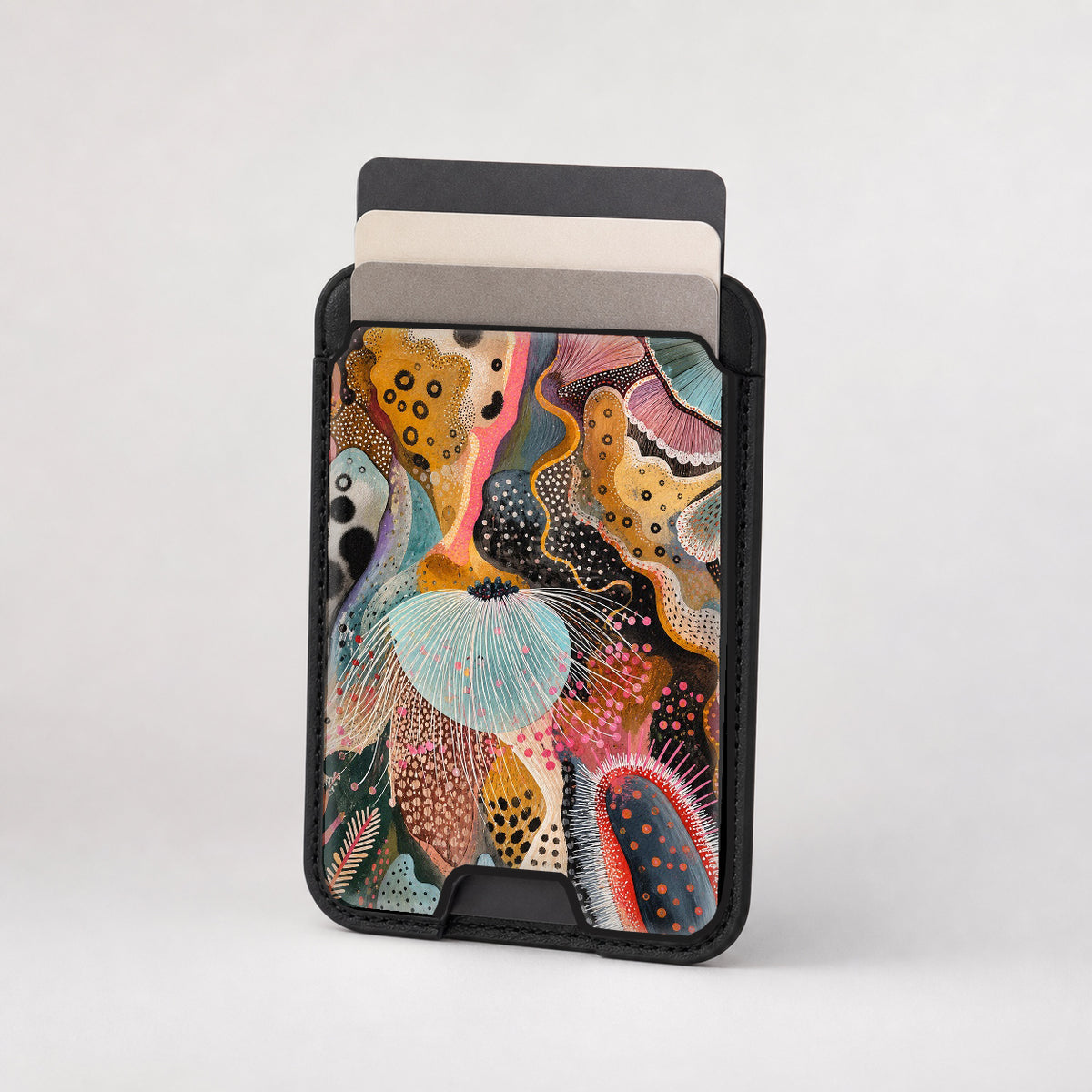 Colorful Abstract Organic Collage MagSafe card holder showing the patterned front