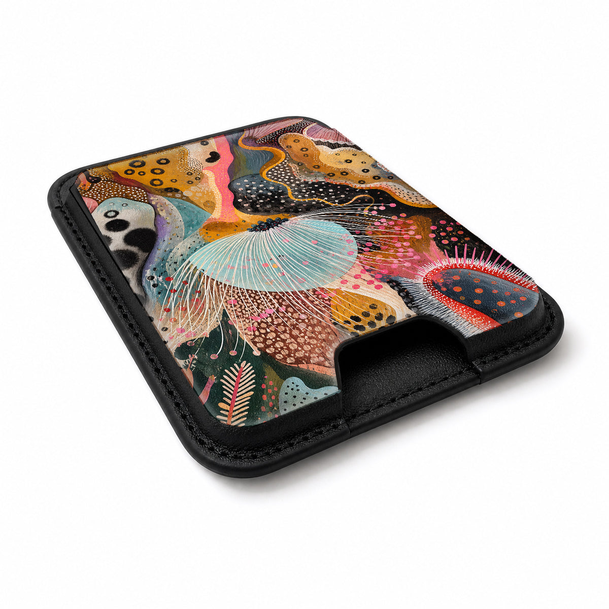 Colorful Abstract Organic Collage MagSafe card holder showing the angled leather surface