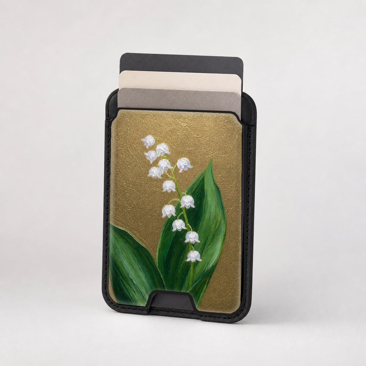 Lily of the Valley on Olive MagSafe card holder showing the patterned front