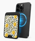 Lemon Botanical MagSafe card holder attached to a compatible iPhone