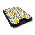 Lemon Botanical MagSafe card holder showing the angled leather surface