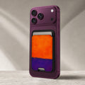 Tangerine Purple Color Block MagSafe card holder showing the detailed leather finish