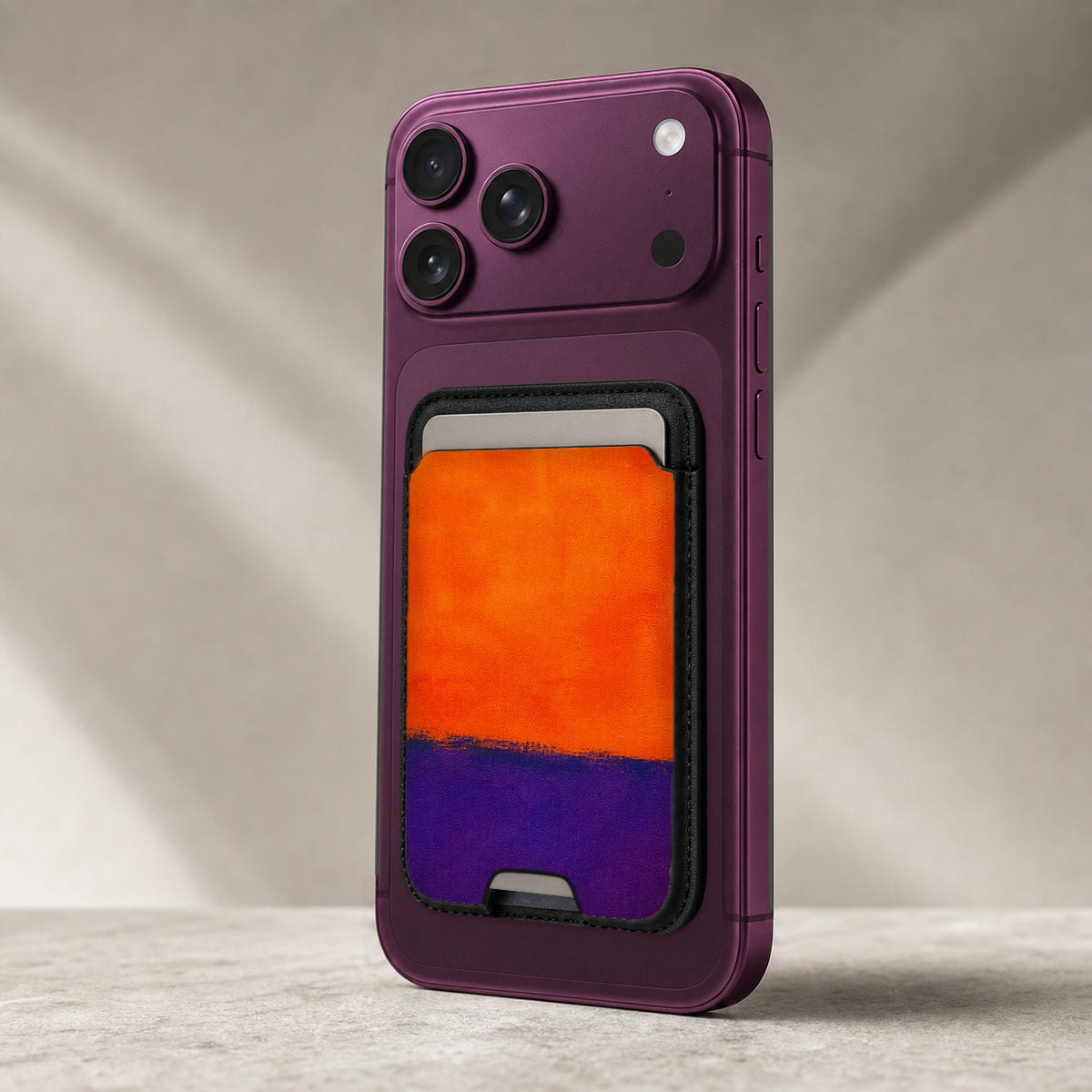 Tangerine Purple Color Block MagSafe card holder showing the detailed leather finish