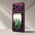 Misty Evergreen Forest MagSafe card holder showing the detailed leather finish