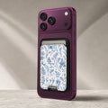 Blue Toile Wildflower MagSafe card holder showing the detailed leather finish