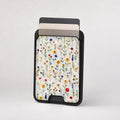Colorful Pressed Wildflower MagSafe card holder showing the patterned front