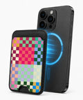 Rainbow Checkerboard Patchwork MagSafe card holder attached to a compatible iPhone