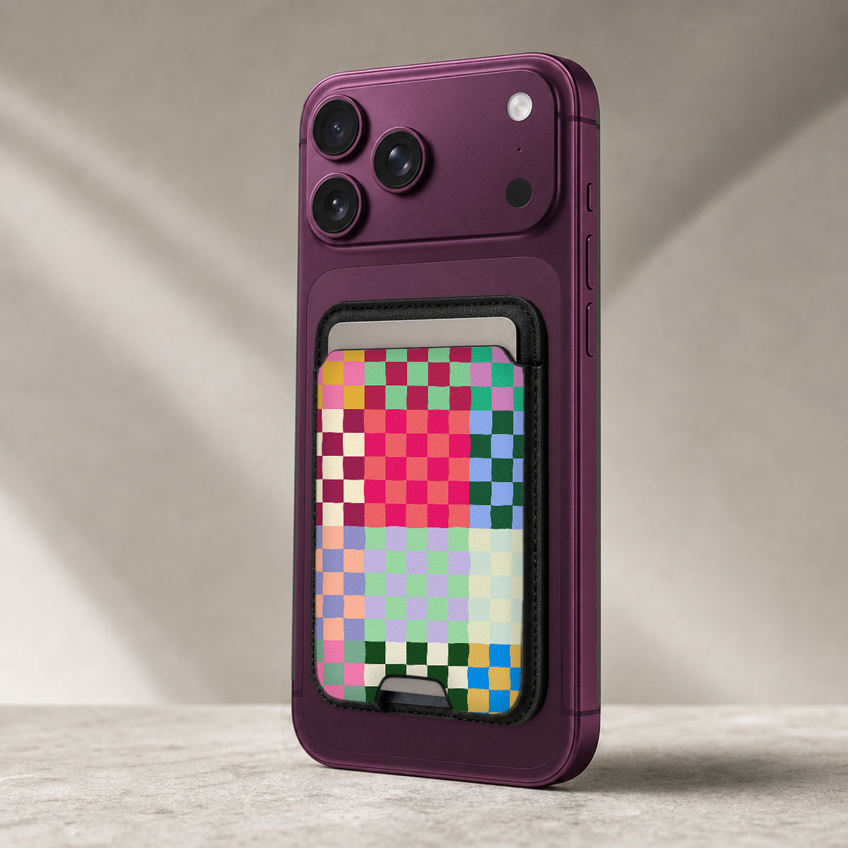 Rainbow Checkerboard Patchwork MagSafe card holder showing the detailed leather finish