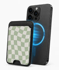 Sage Green Wavy Checkerboard MagSafe card holder attached to a compatible iPhone