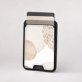 Beige Abstract Pebble MagSafe card holder showing the patterned front