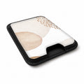 Beige Abstract Pebble MagSafe card holder showing the angled leather surface