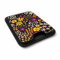 Black Folk Garden Floral MagSafe card holder showing the angled leather surface