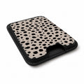 Black Dalmatian Spot MagSafe card holder showing the angled leather surface