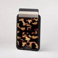 Tortoiseshell MagSafe card holder showing the patterned front