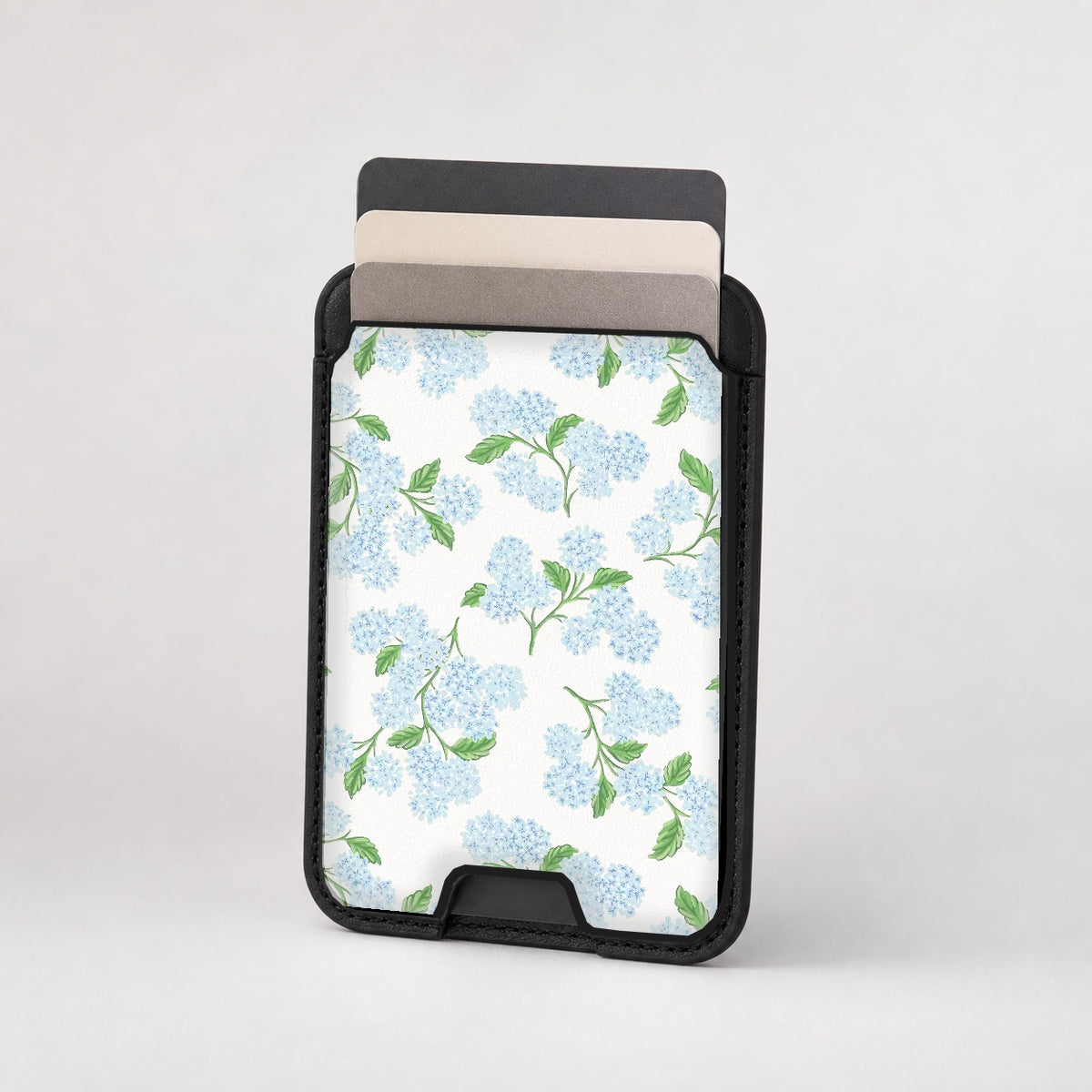 Blue Hydrangea Botanical MagSafe card holder showing the patterned front