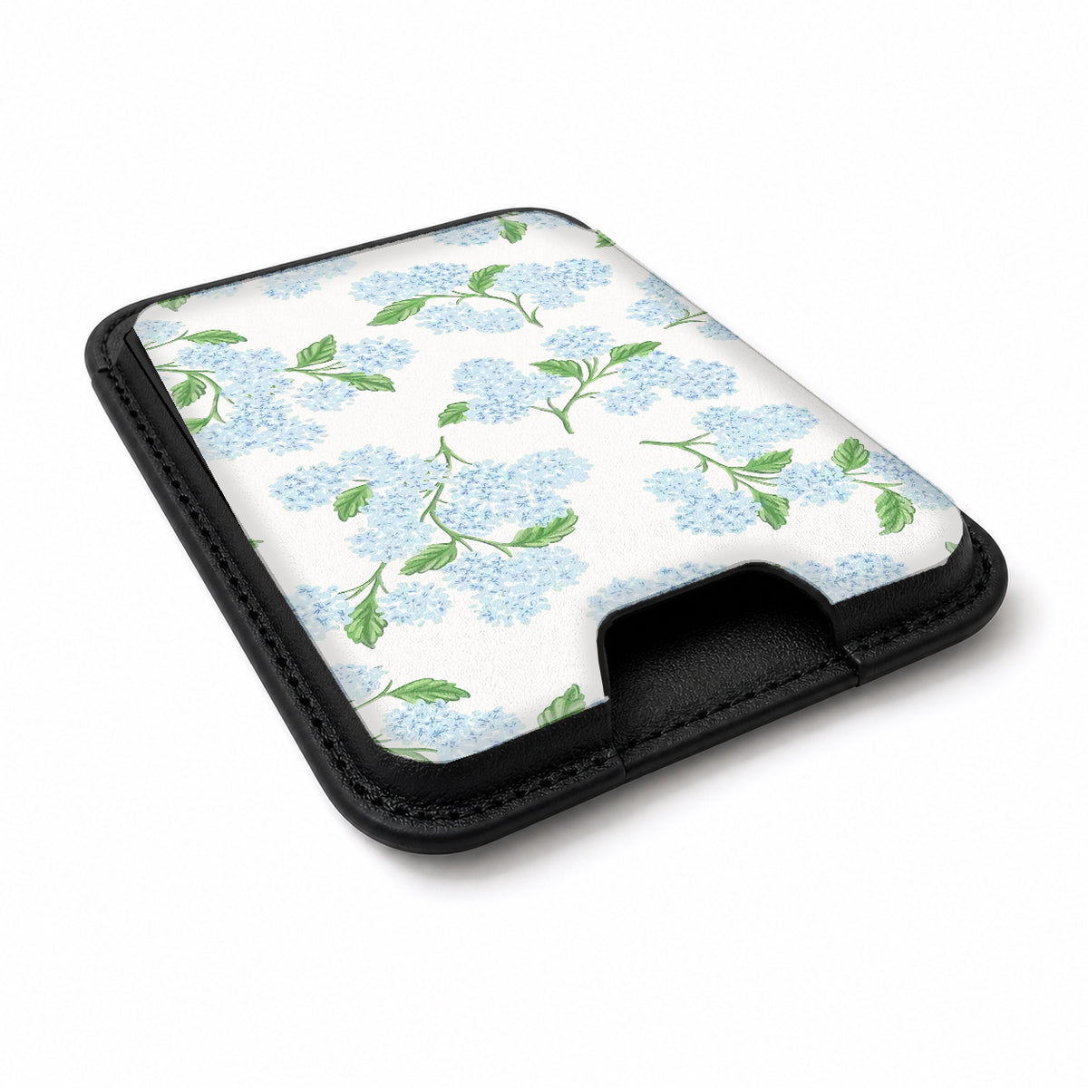 Blue Hydrangea Botanical MagSafe card holder showing the angled leather surface