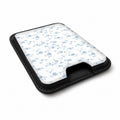 Powder Blue Ditsy Floral MagSafe card holder showing the angled leather surface