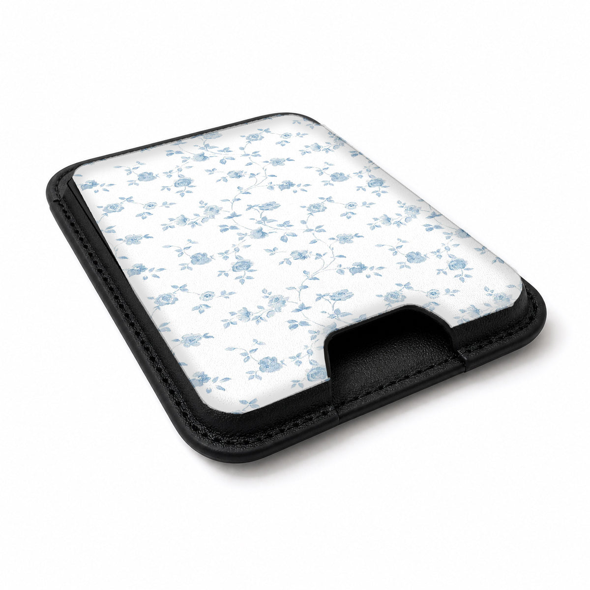 Powder Blue Ditsy Floral MagSafe card holder showing the angled leather surface