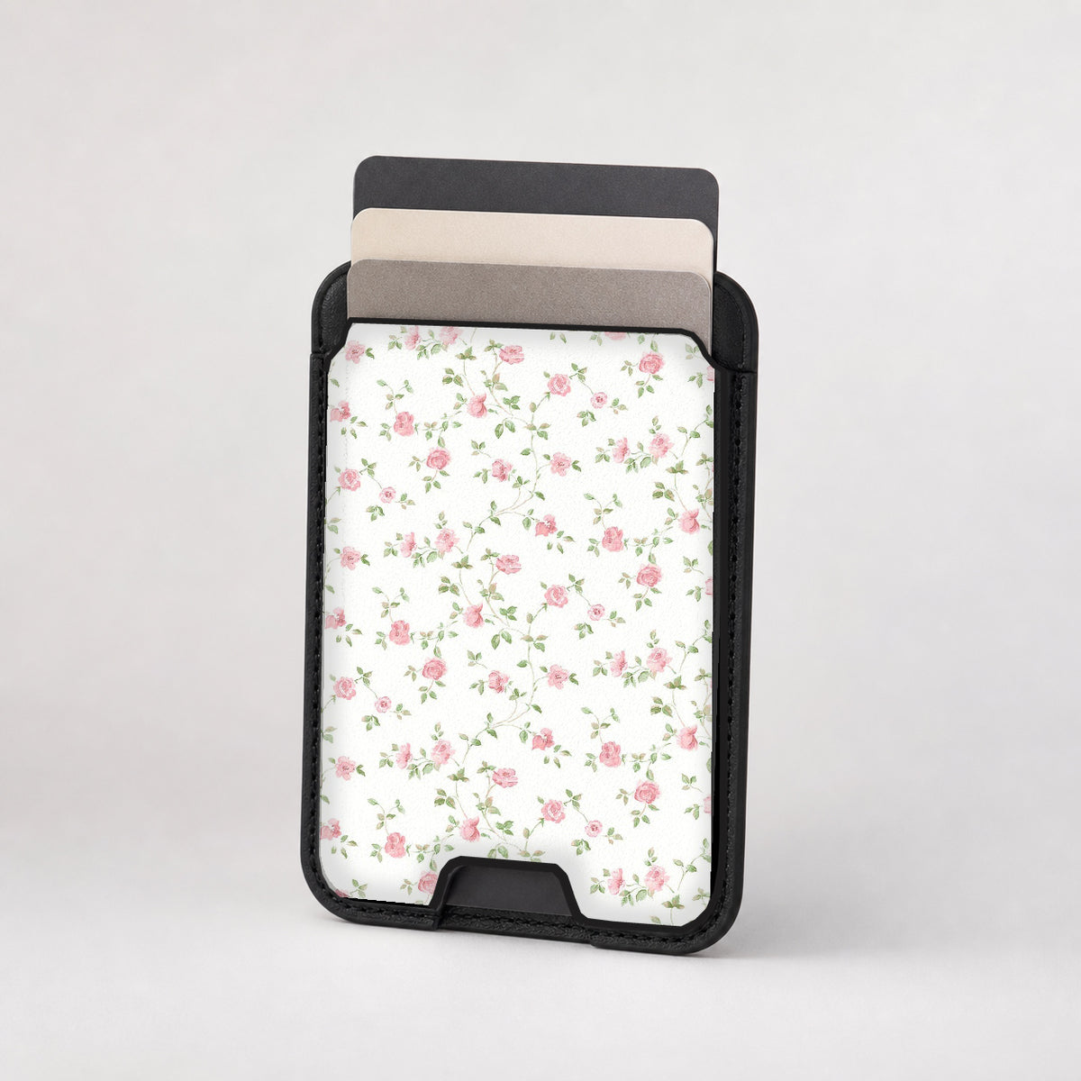 Pink Ditsy Floral MagSafe card holder showing the patterned front