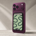 Sage Green Retro Swirl MagSafe card holder showing the detailed leather finish