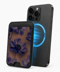 Midnight Purple Floral MagSafe card holder attached to a compatible iPhone