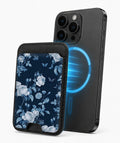 Navy Blue Rose Floral MagSafe card holder attached to a compatible iPhone